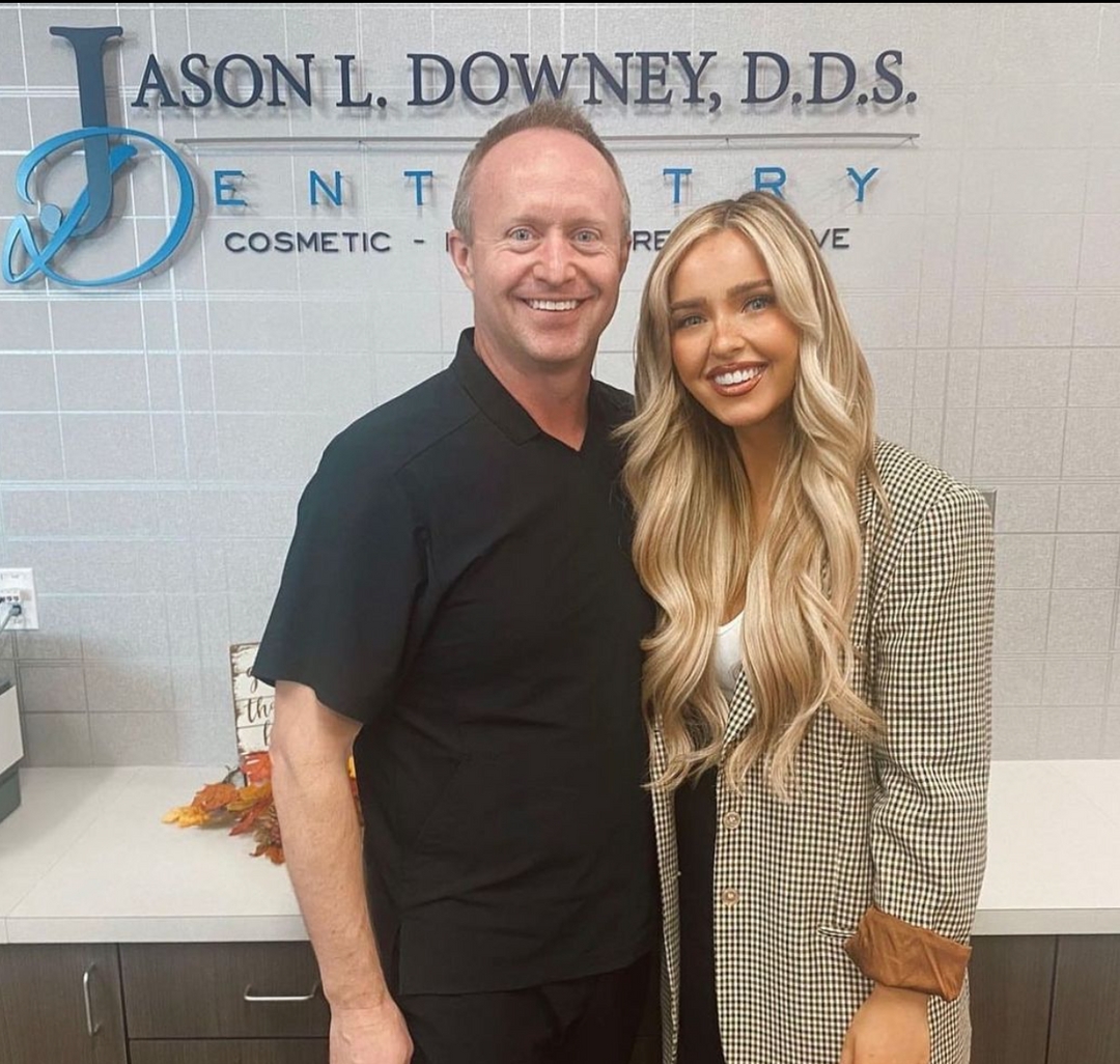 Dental patient with Dr. Jason Downey after receiving porcelain veneers 
